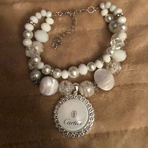 Designer inspired beautiful white and silver tone beaded bracelet.